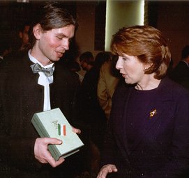 Ondej Piln presenting President of Ireland, Mary McAleese,<br> with <i>Vzdlen tny nadje - antologie irsk poezie</i><br> (The Distant Music of Hope: An Anthology of Irish Poetry)<br> edited by Ondej Piln, Justin Quinn and Ivana Bozdchov (2000).